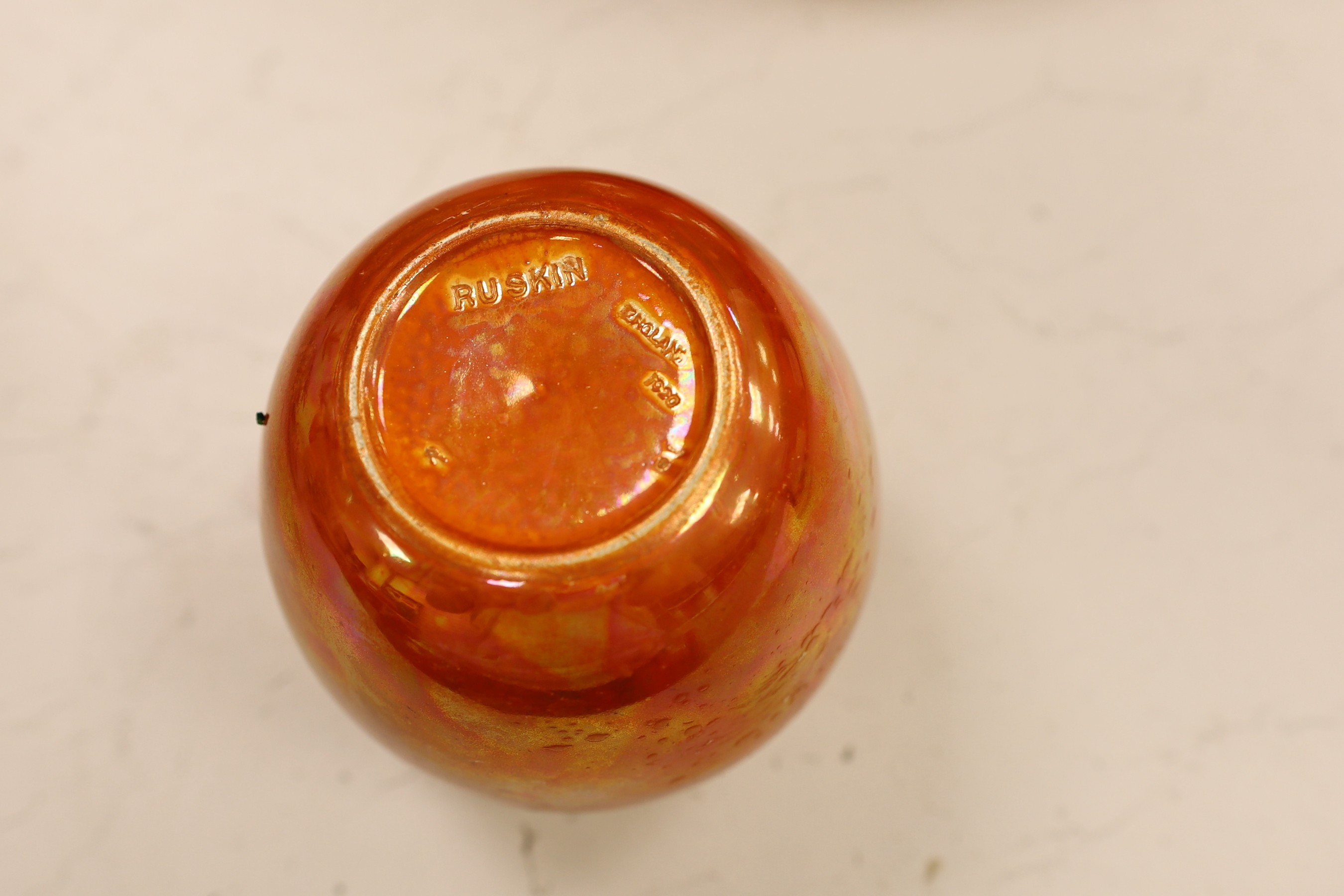 A Ruskin orange lustre vase, dated 1914 and a similar ginger jar, dated 1920, tallest 19cm